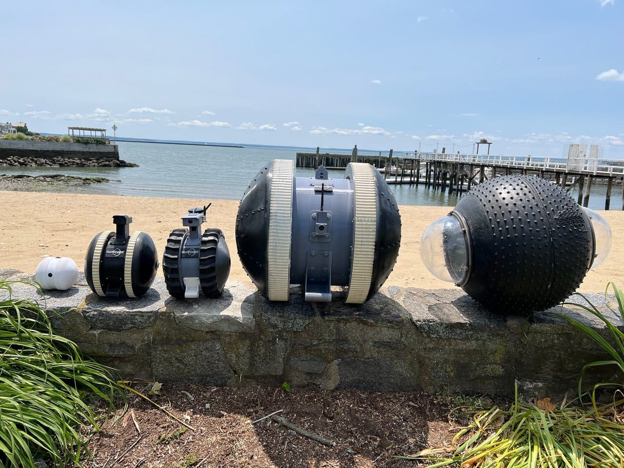 GuardBot amphibious robot lineup on the Stamford shoreline