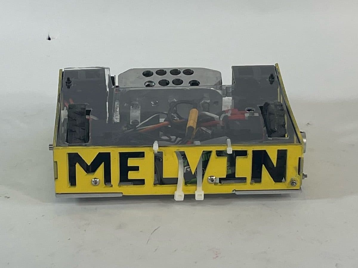 Melvin V2 head-on — yellow "MELVIN" nameplate