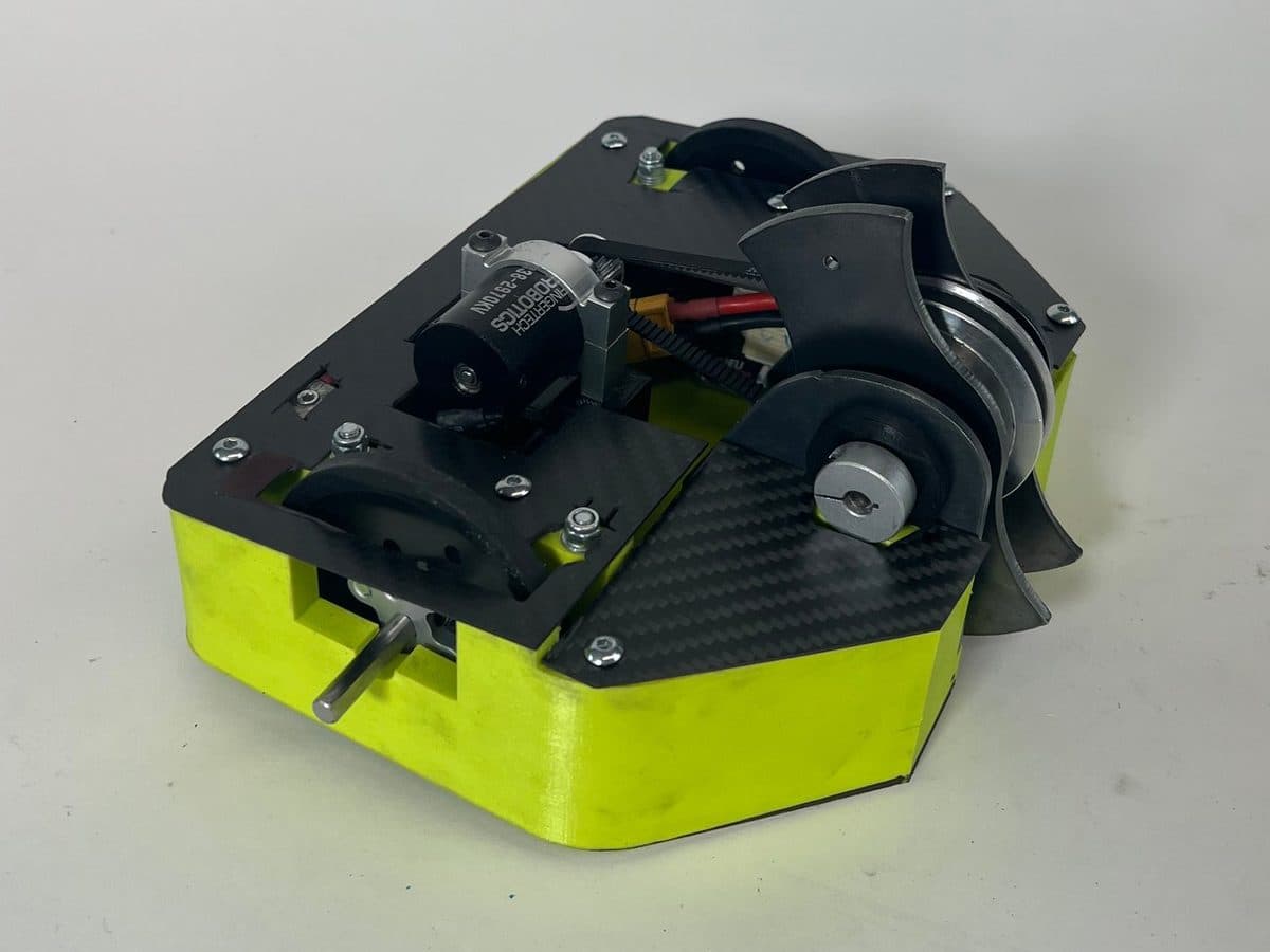 Melvin V4 — yellow TPU chassis with carbon fiber plates